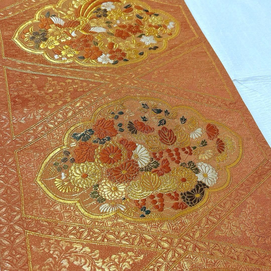 梅垣織物　袋帯　西陣織　七宝菱蒔絵文　正絹　金糸　オレンジゴールド系　逸品