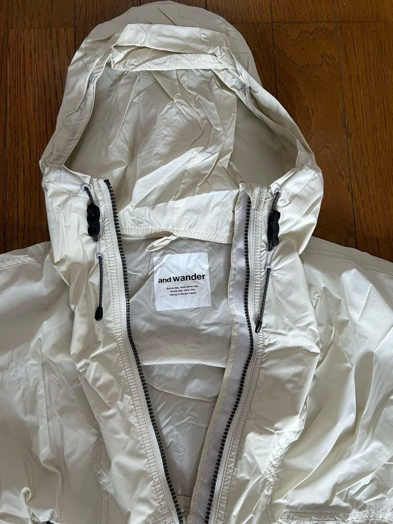 ジャケット・アウター AND WANDER PERTEX WIND JACKET
