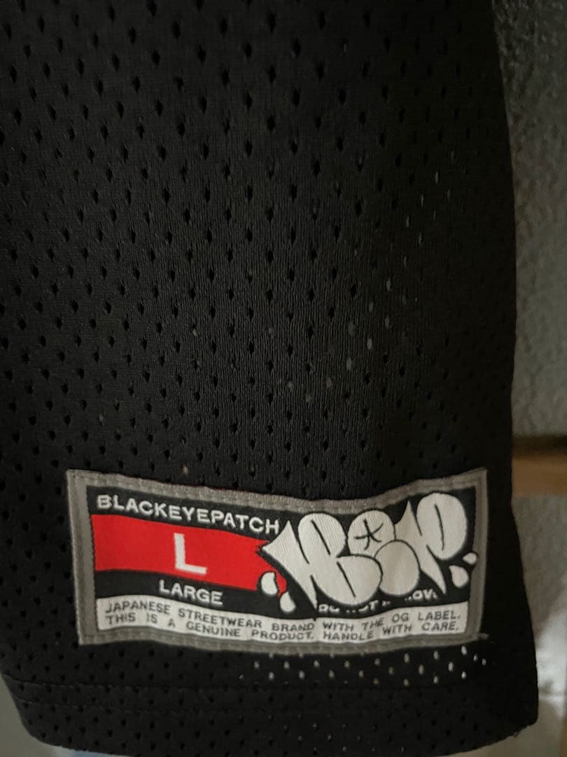 black eye patch DOLLAR ホッケーシャツ　L