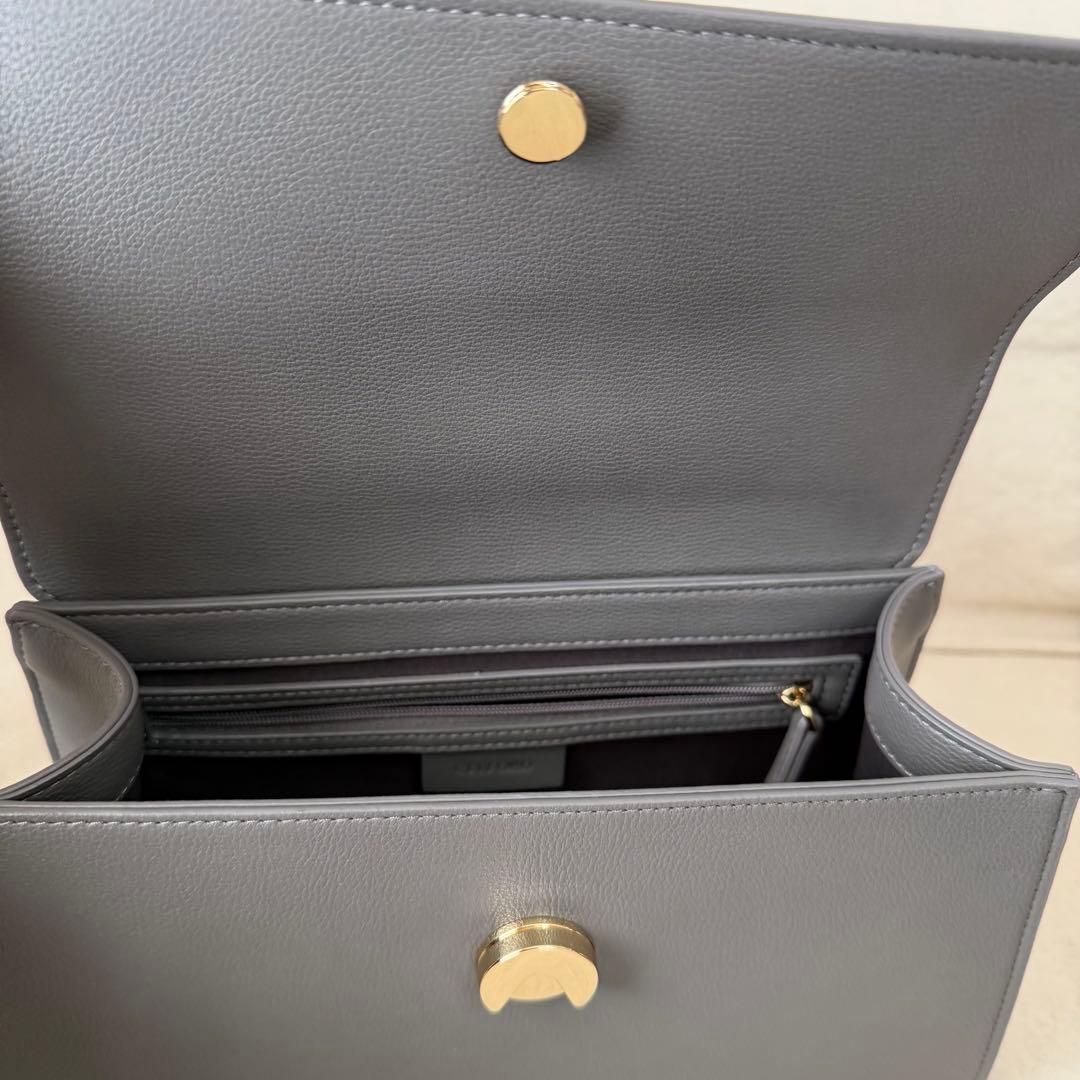 セルフォード　ビジューツイストバックルハンドバッグ　グレー