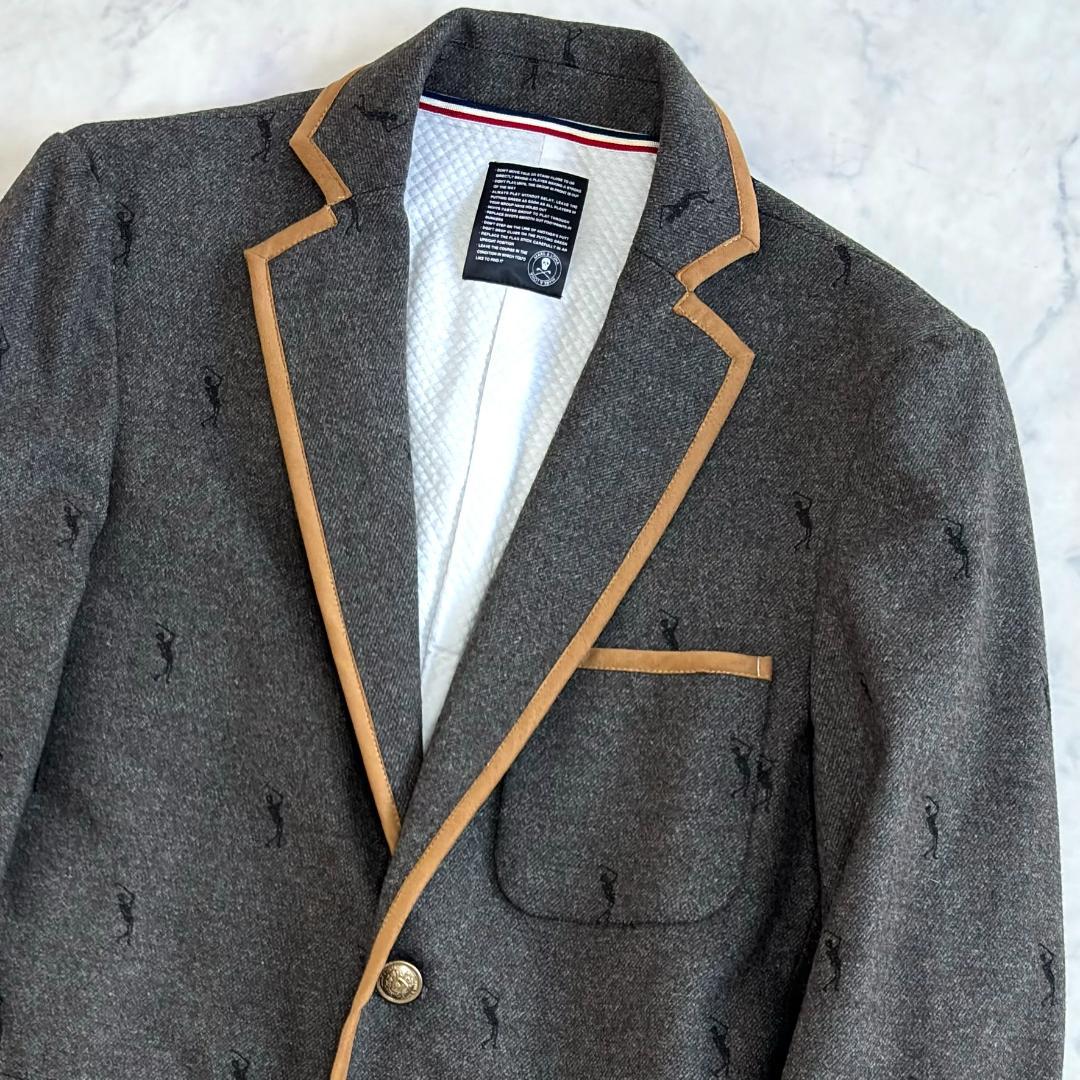 マークアンドロナ ジャケット 刺繡ロゴ パイピング 金ボタン グレー tw5