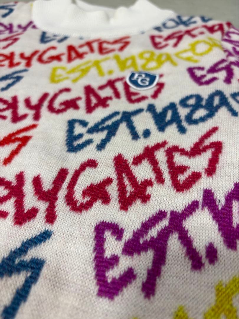 （超美品）パーリーゲイツ、落書き柄、ニットセーターとスカートのセット、サイズ0