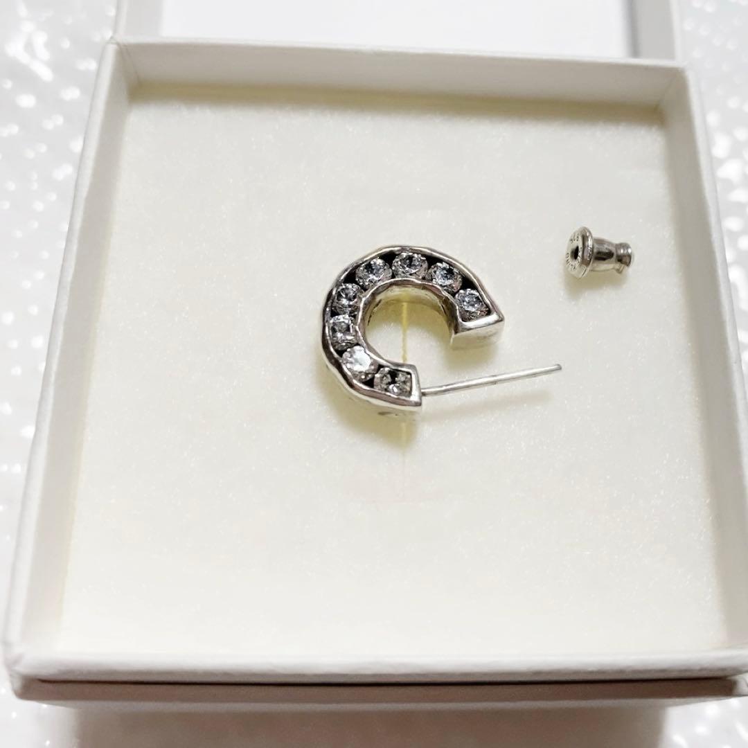 e.m. イーエム ジルコニア埋め込みフープピアス 片耳