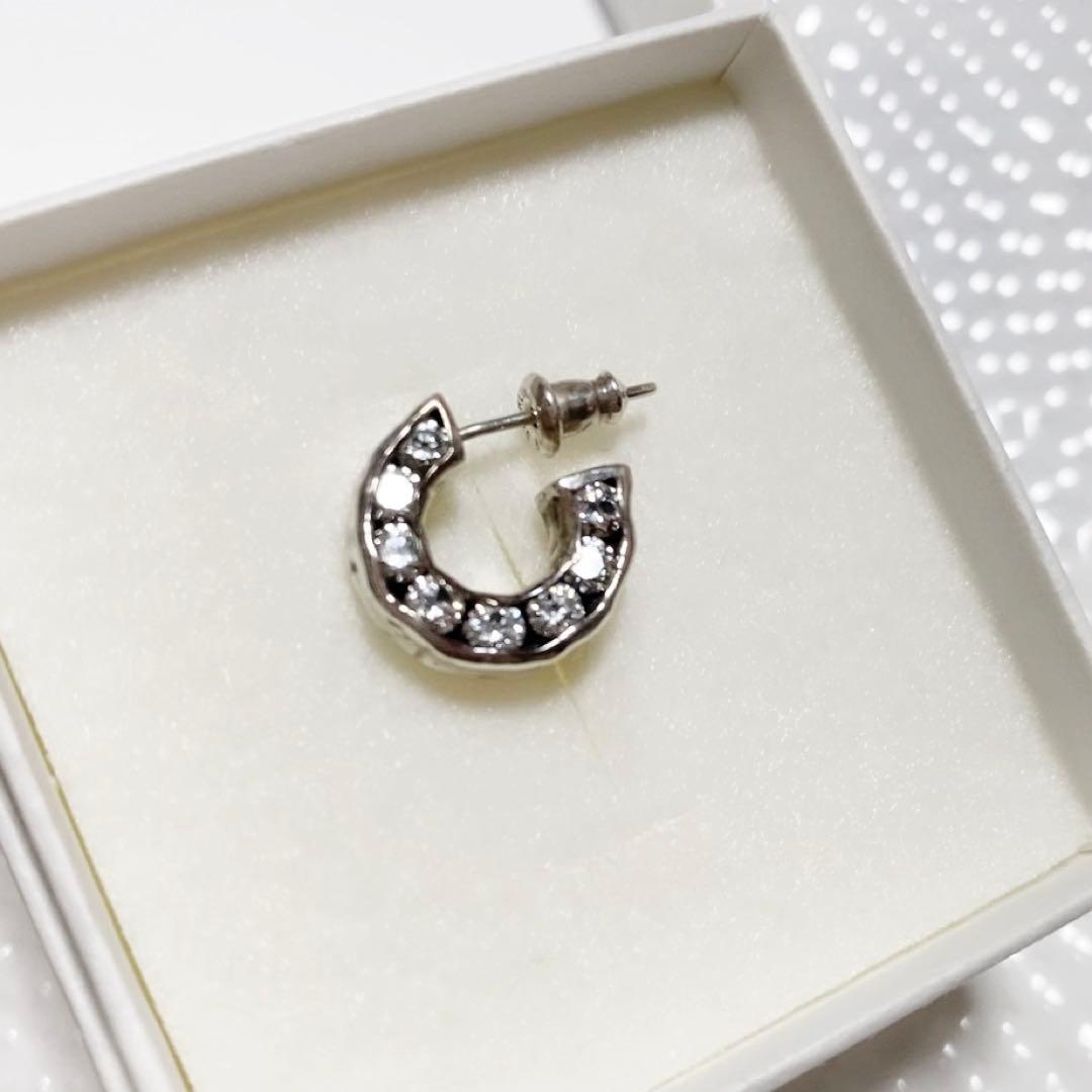 e.m. イーエム ジルコニア埋め込みフープピアス 片耳