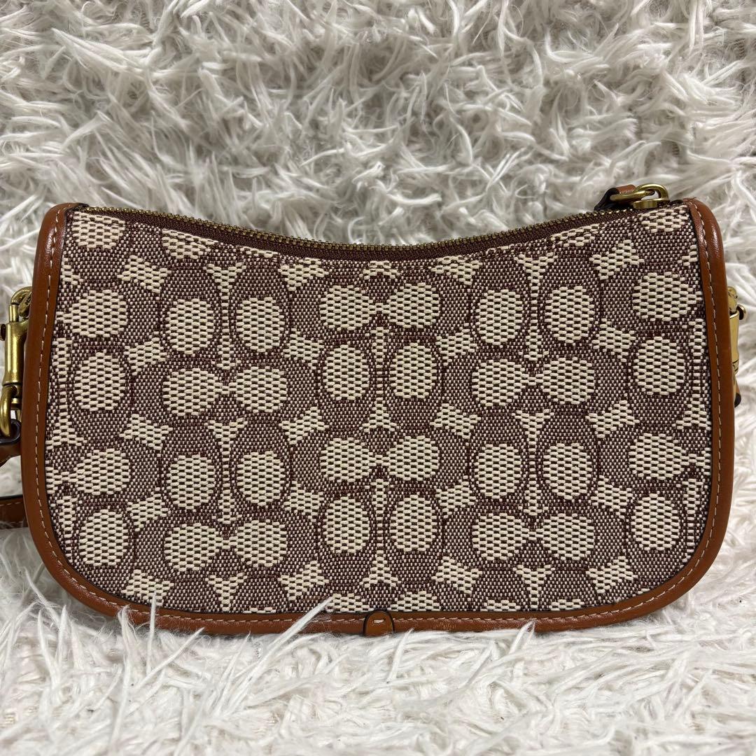 ✨極美品/50周年限定品✨コーチ×ディズニー スゥインガーバッグ ターンロック