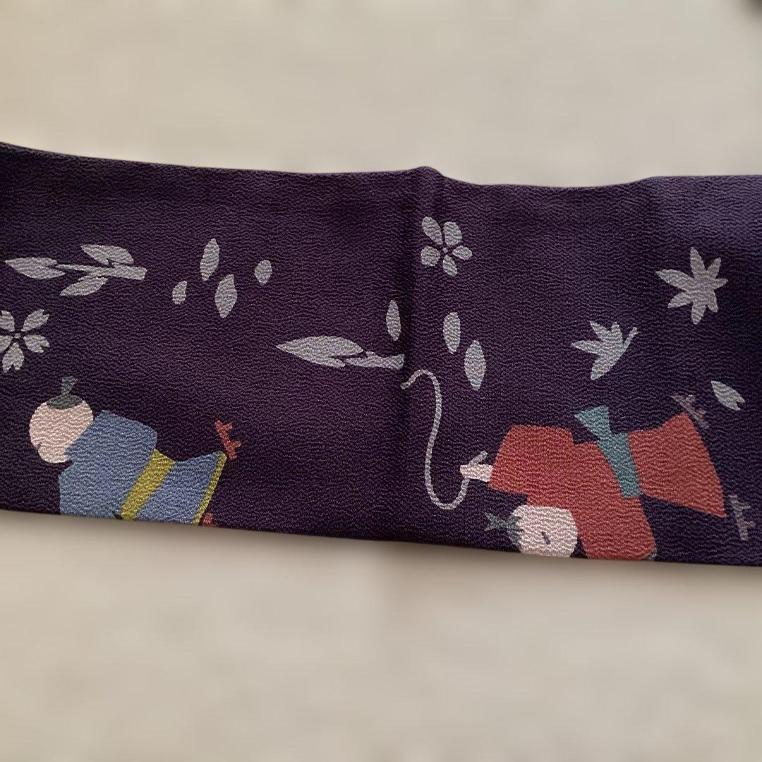 ほぼ未使用品　九寸名古屋帯 全通　正絹縮緬地　濃紫　遊ぶ童子柄　ガード加工済