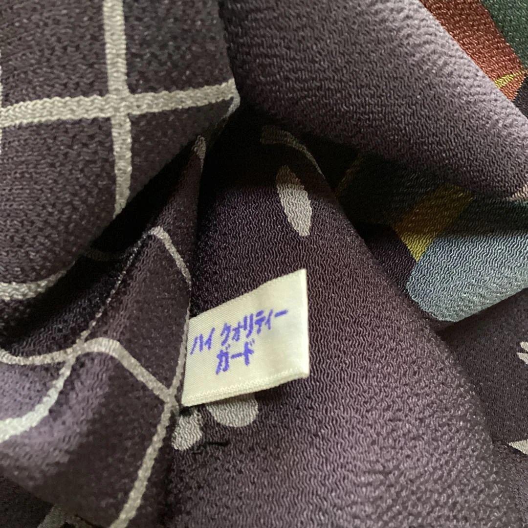 ほぼ未使用品　九寸名古屋帯 全通　正絹縮緬地　濃紫　遊ぶ童子柄　ガード加工済