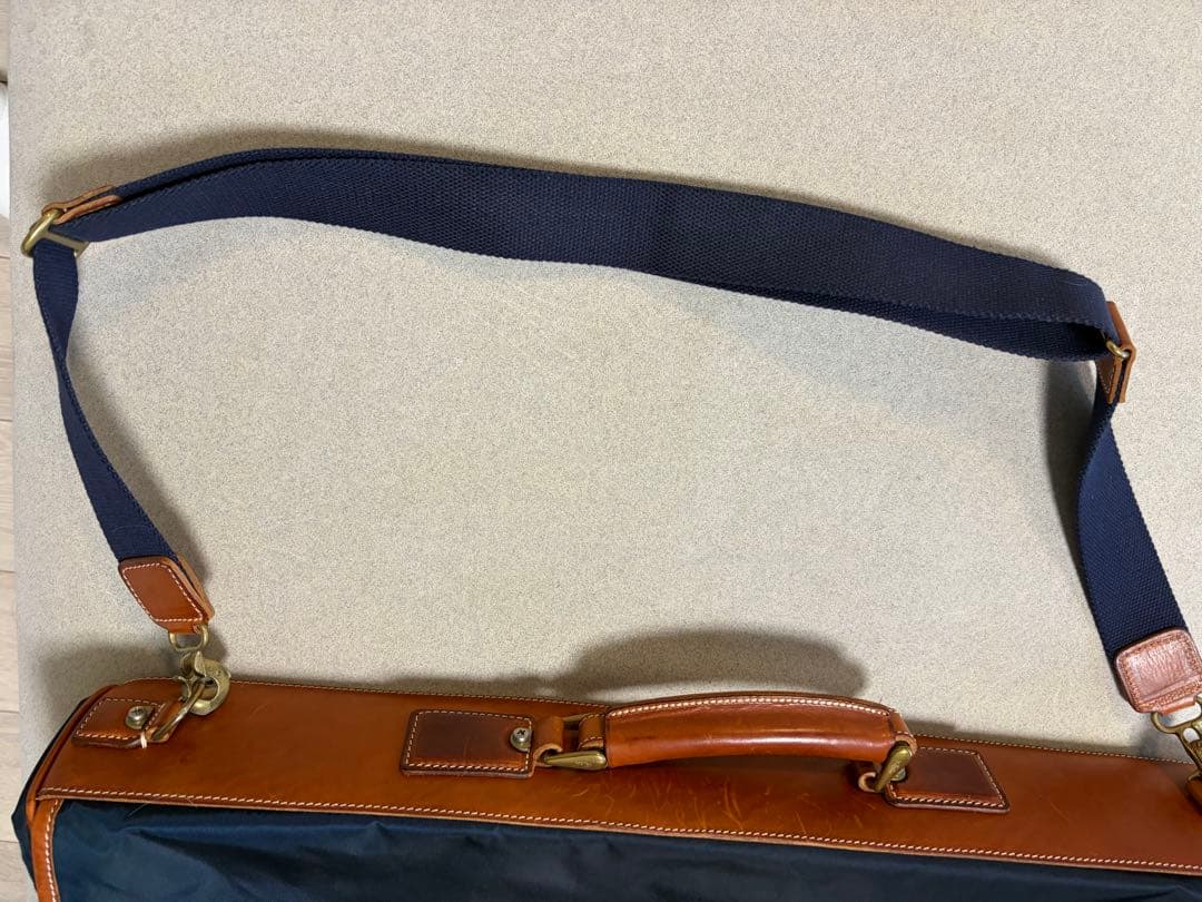 メルカリ市割中！フェリージ Felisi ナイロン ガーメントバッグ