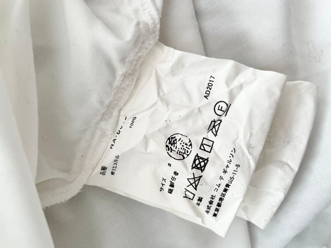 コムコム　フレアシャツ