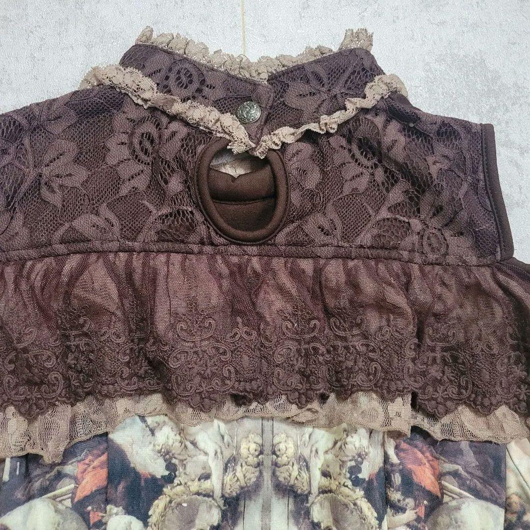 美品 オッズオネスト 天使柄 肩出しレースアップワンピース 茶