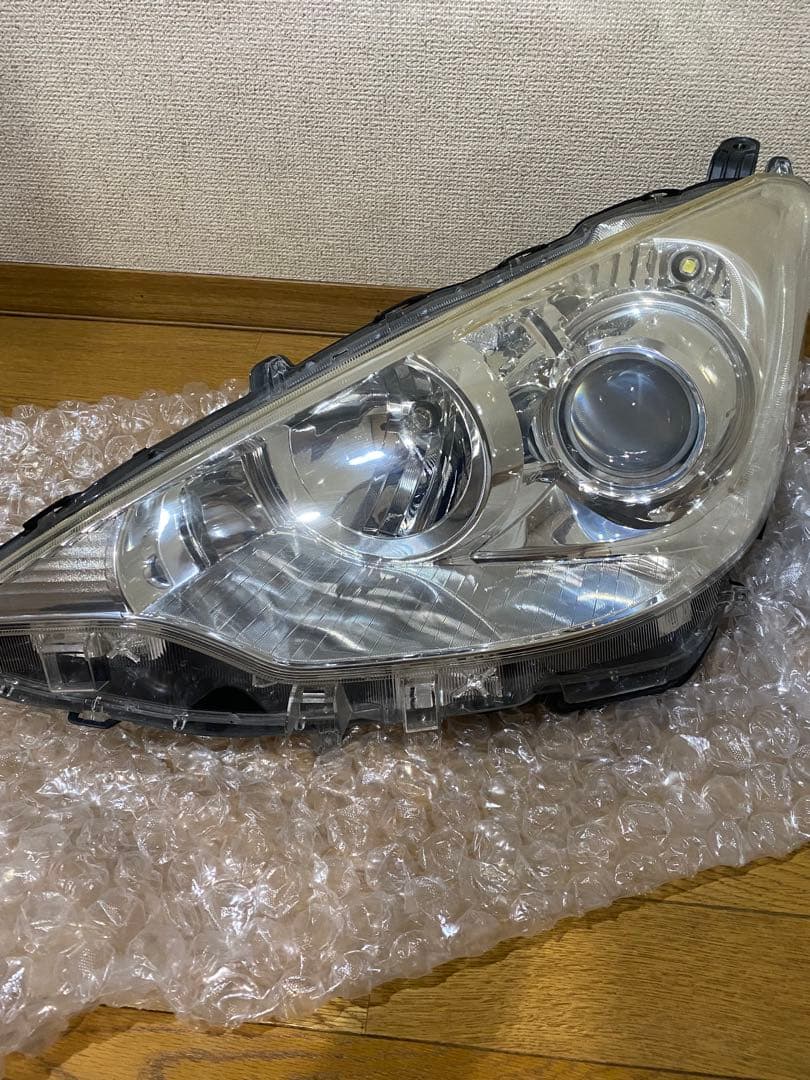 NHP10 アクア 前期 ハロゲン ヘッドライト 左側