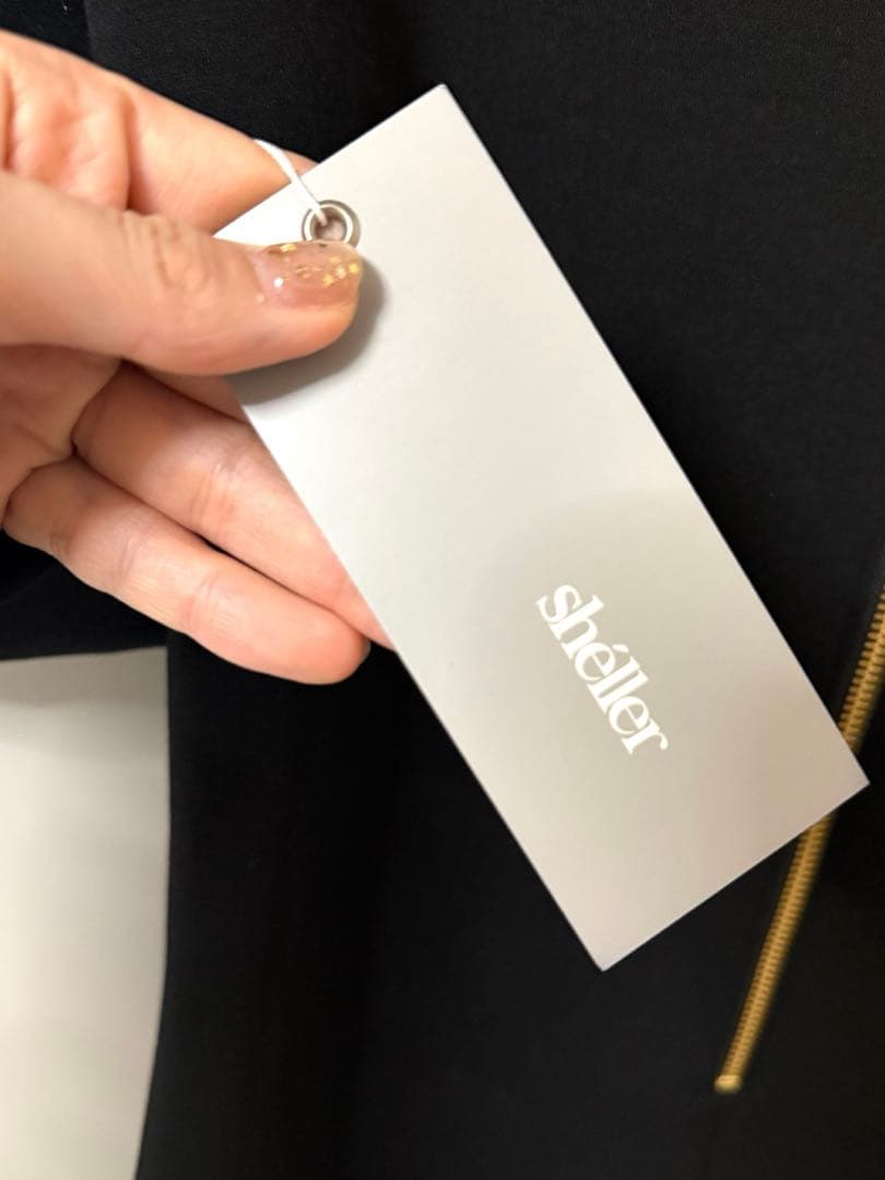 シェリエ sheller バックZIPスウェットミニワンピース フリル ブラック