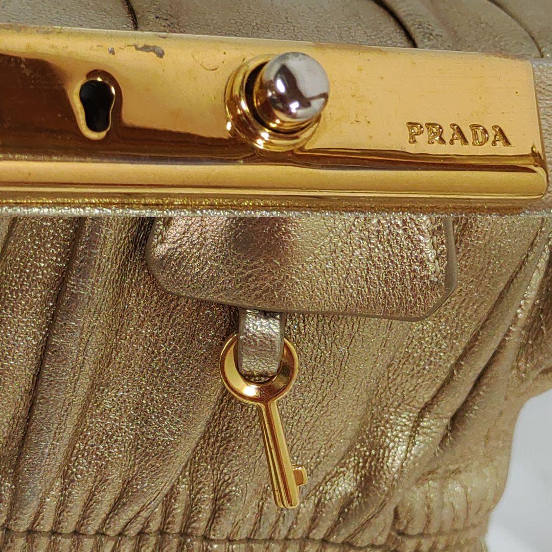 【美品】プラダ ハンドバッグ がま口 ギャザー レザー ギャラ付 ゴールド