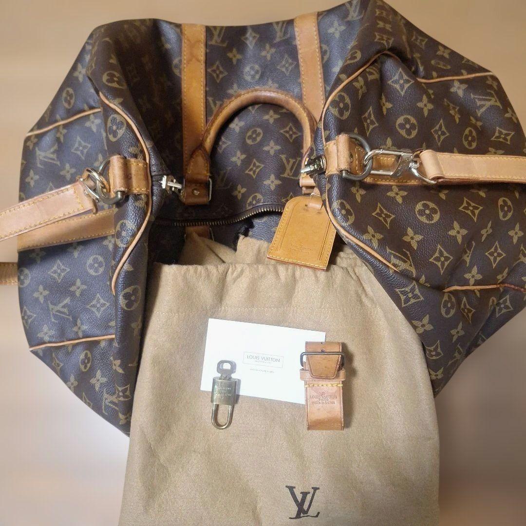 Louis Vuittonボストンバック 南京錠、ネームタグ収納袋付き