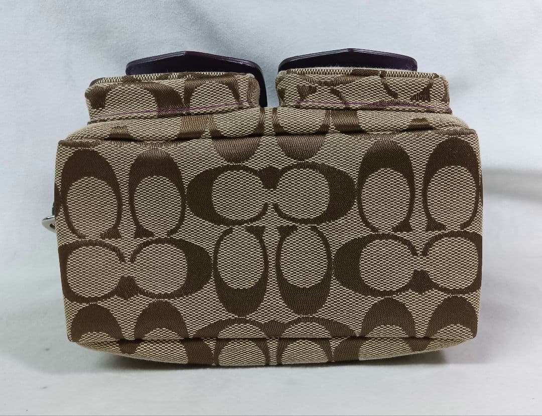 COACH(コーチ) ポーチ　ハンドバッグ　シグネチャー柄　ダブルターンロック