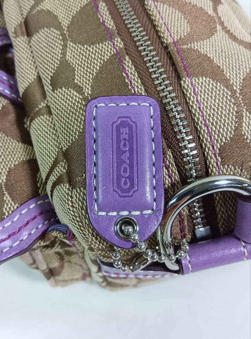 COACH(コーチ) ポーチ　ハンドバッグ　シグネチャー柄　ダブルターンロック