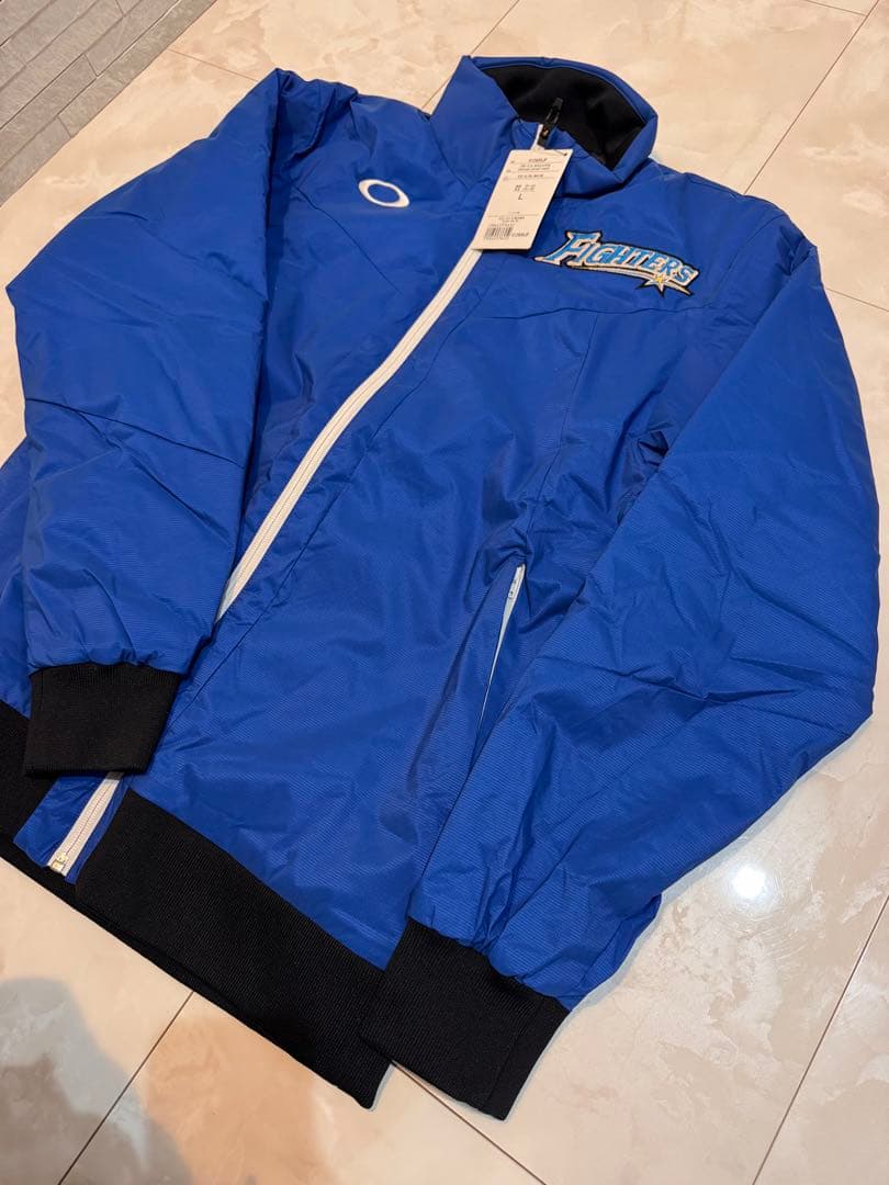 Oakley ファイターズ　グラウンドジャケット Lサイズ