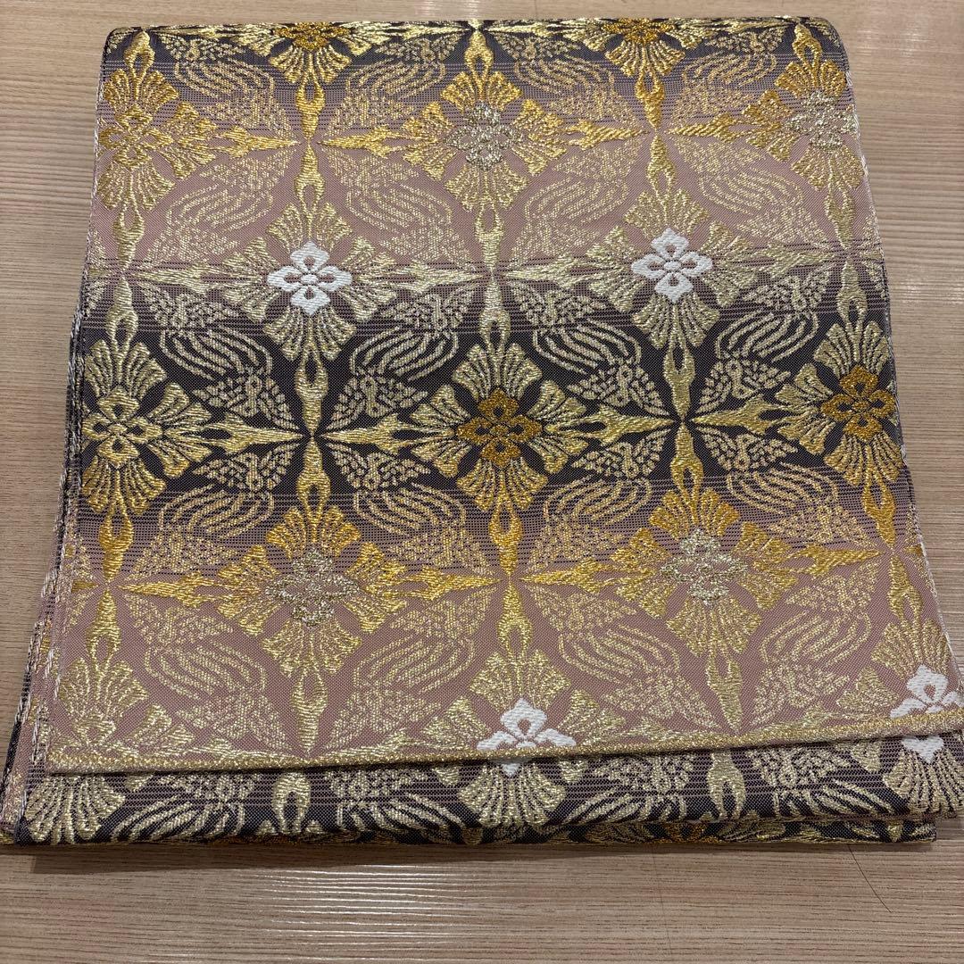 金色とピンク地の七宝　袋帯