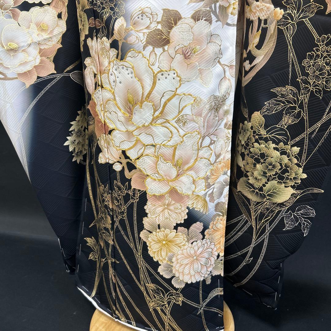 ゴージャスな黒白染め分けにゴールドの振袖セット