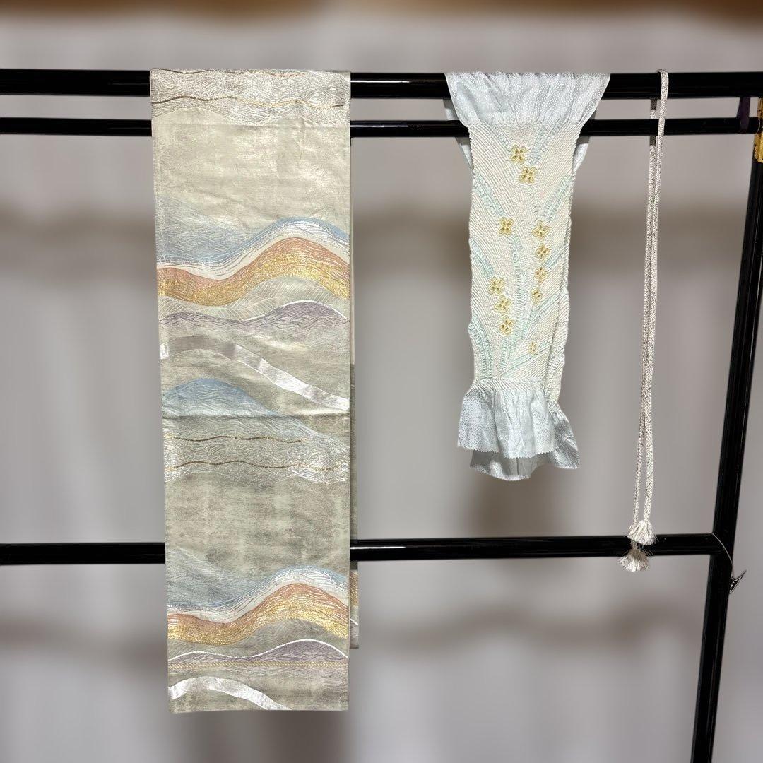 未使用近い　美品　袷　正絹　本場大島紬　フルセット　西陣綴れ織り袋帯