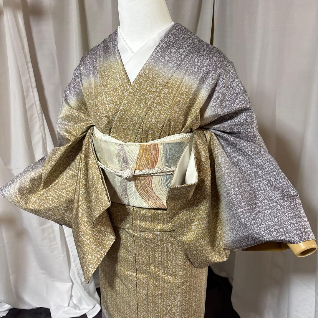 未使用近い　美品　袷　正絹　本場大島紬　フルセット　西陣綴れ織り袋帯