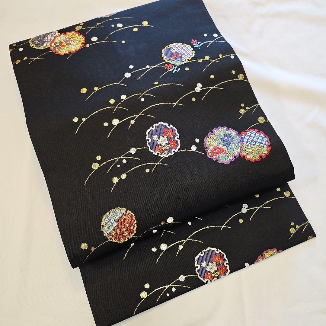 名古屋帯☆雪輪文様☆九寸☆露草☆正絹☆セミフォーマル☆黒地☆金彩