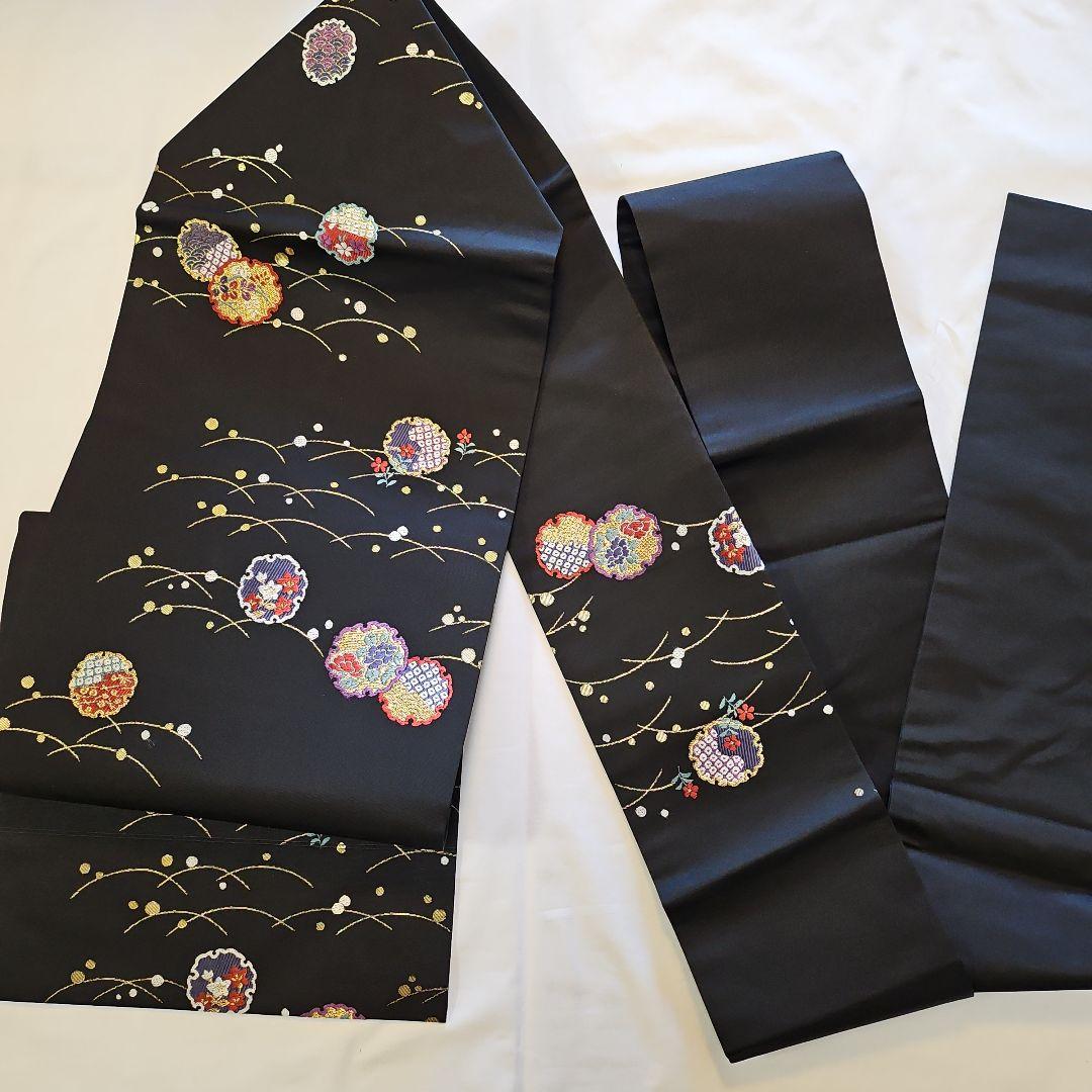 名古屋帯☆雪輪文様☆九寸☆露草☆正絹☆セミフォーマル☆黒地☆金彩