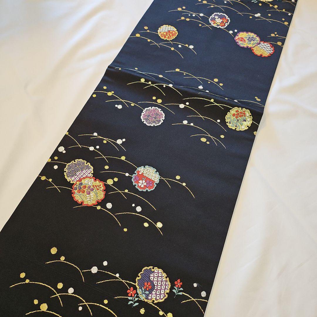 名古屋帯☆雪輪文様☆九寸☆露草☆正絹☆セミフォーマル☆黒地☆金彩