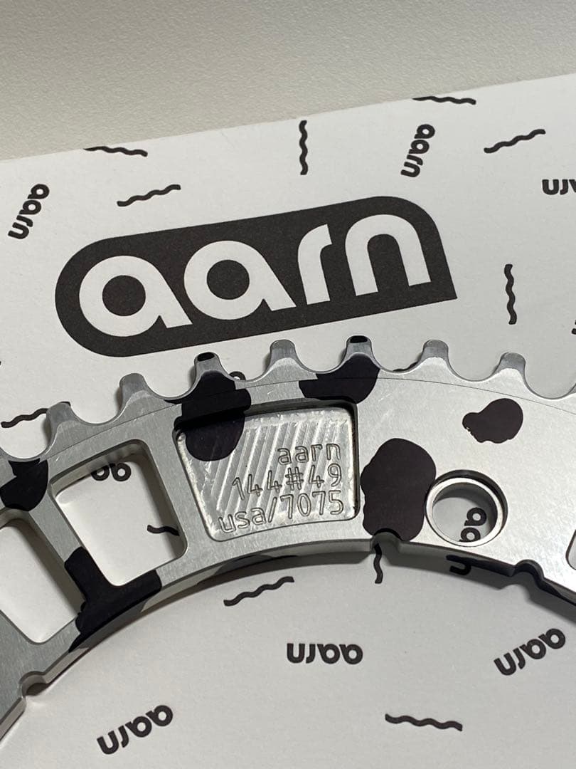 aarn アーロン チェーンリング 厚刃 PCD144 49T シルバー地 黒柄