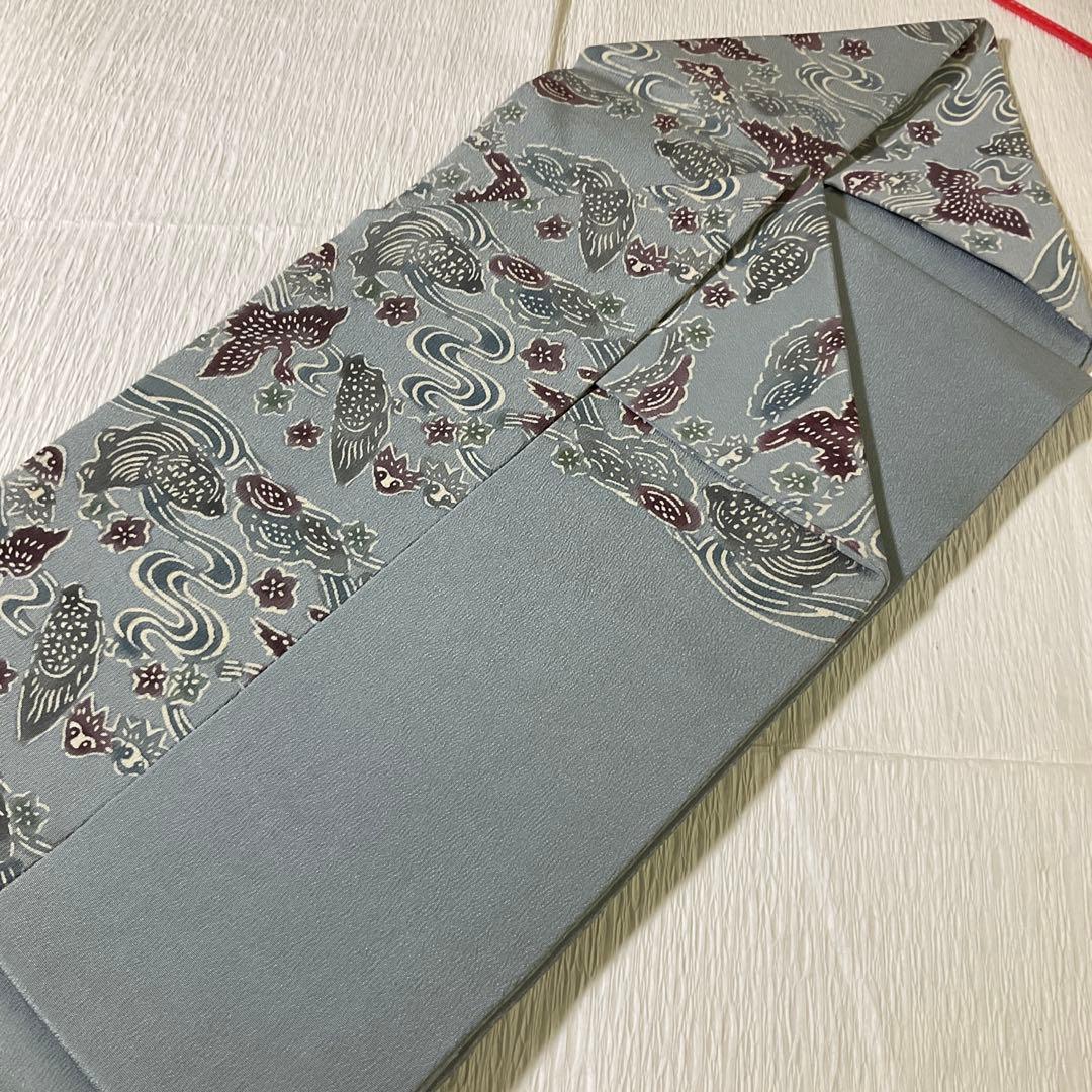 名古屋帯　縮緬　型染め　うすずみ色系　垂れ無地　亀　鶴？　流水　花