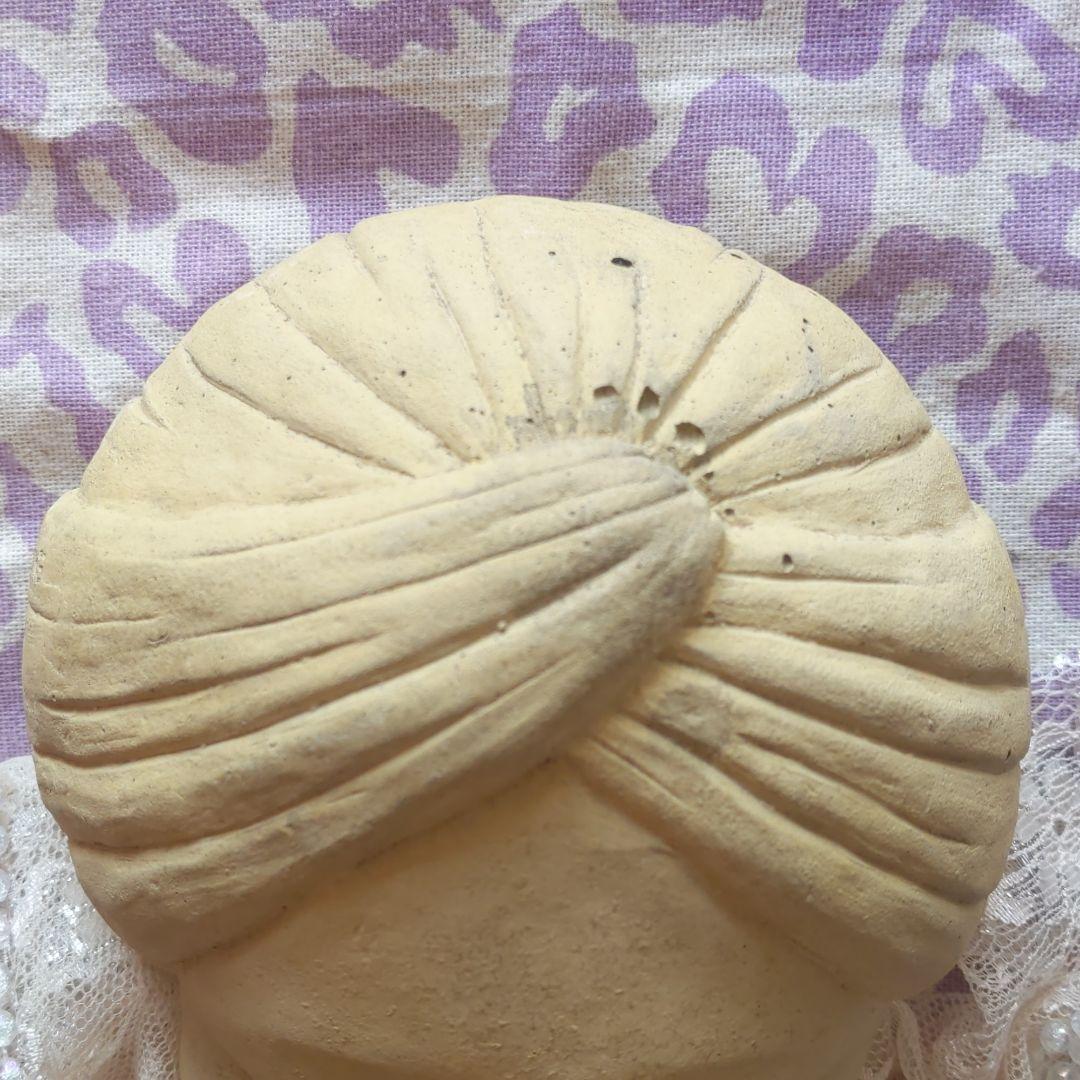 アンティークインドの少年陶器製　ウォールデコレーション