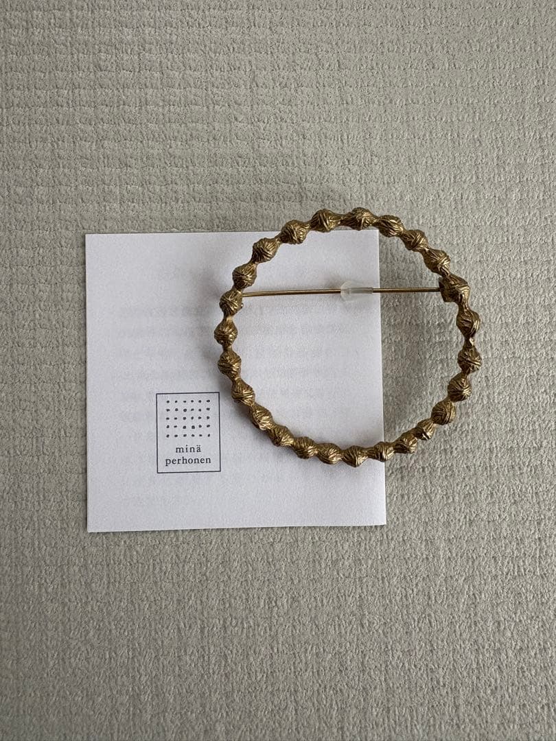 mina perhonen ミナペルホネン　タンバリン　ブローチ　ゴールド