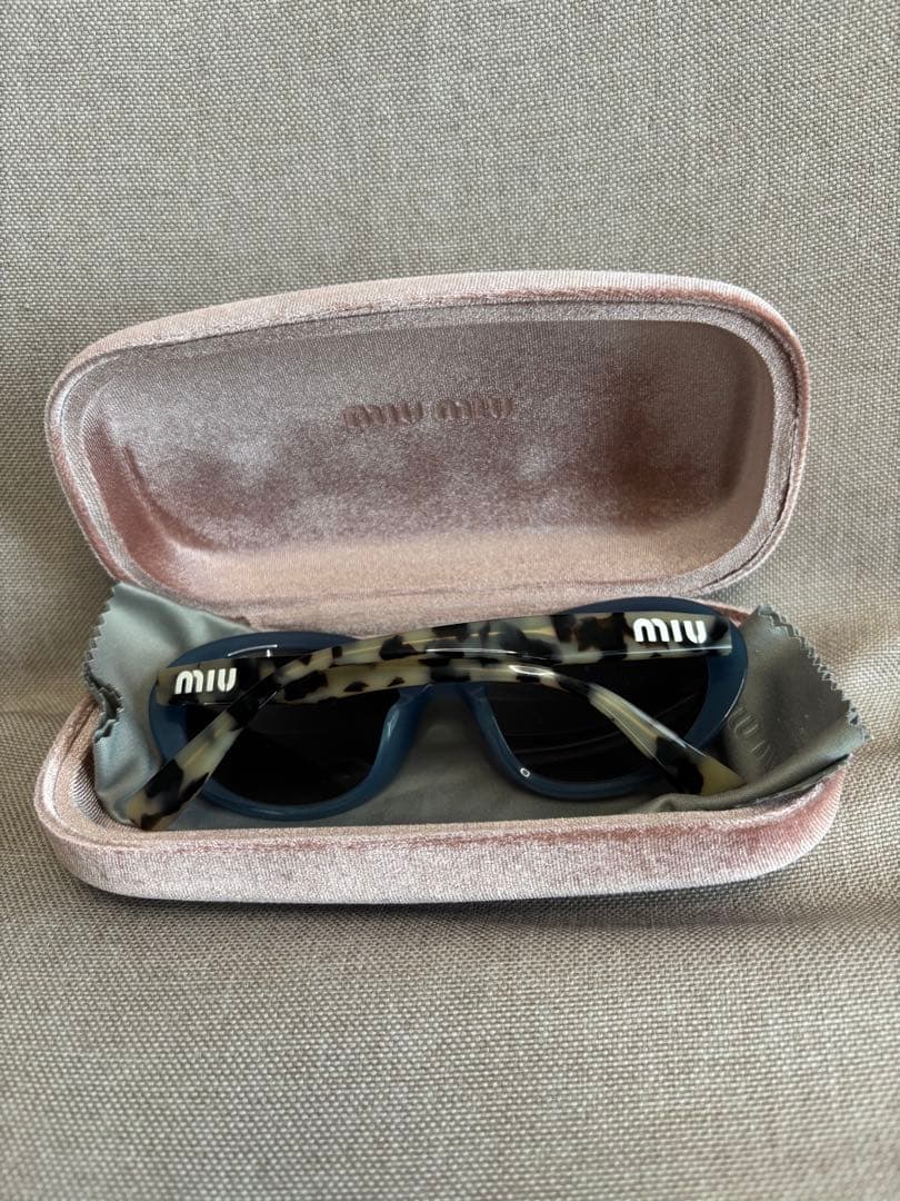 ミュウミュウ サングラス miumiu SMU01UA 1183A0