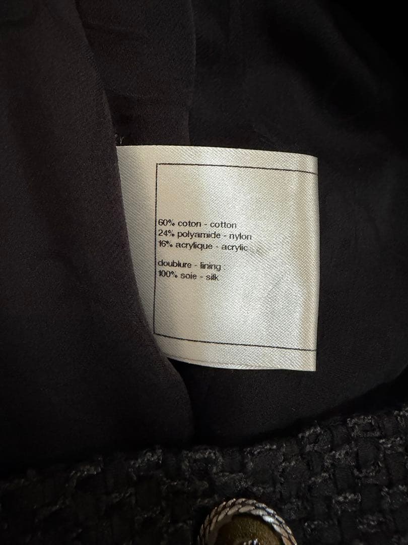 シャネルシャネル黒フリルワンピースサイズ42ツイード素材