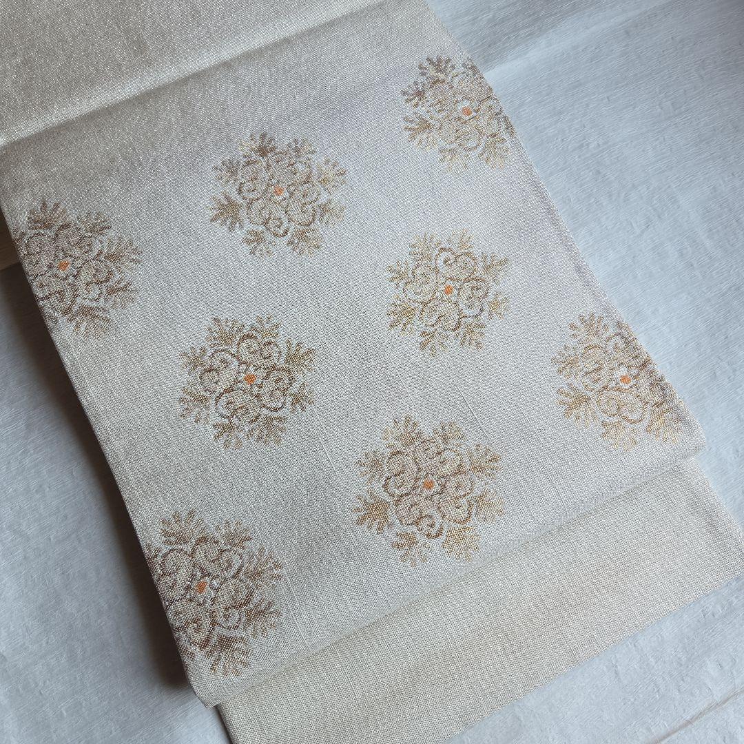 上品な織と煌めき　華文様の袋帯