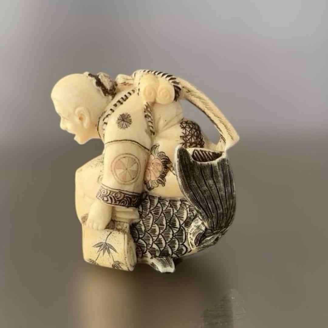 時代物 置物 魚にまたがる人物