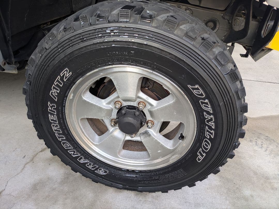 ジムニーJA22純正ホイール・ダンロップ　グラントレックMT2です。