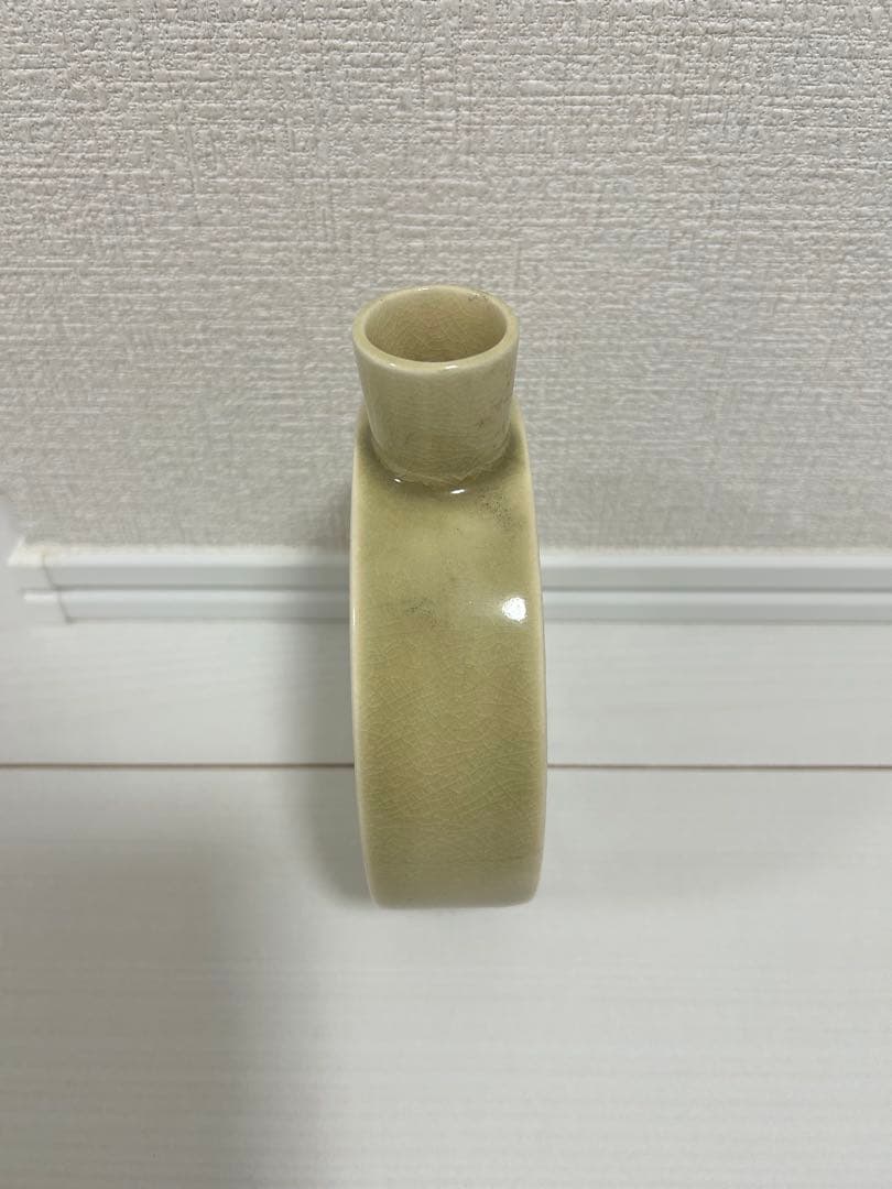 円形陶器花瓶 動物模様 幾何学模様