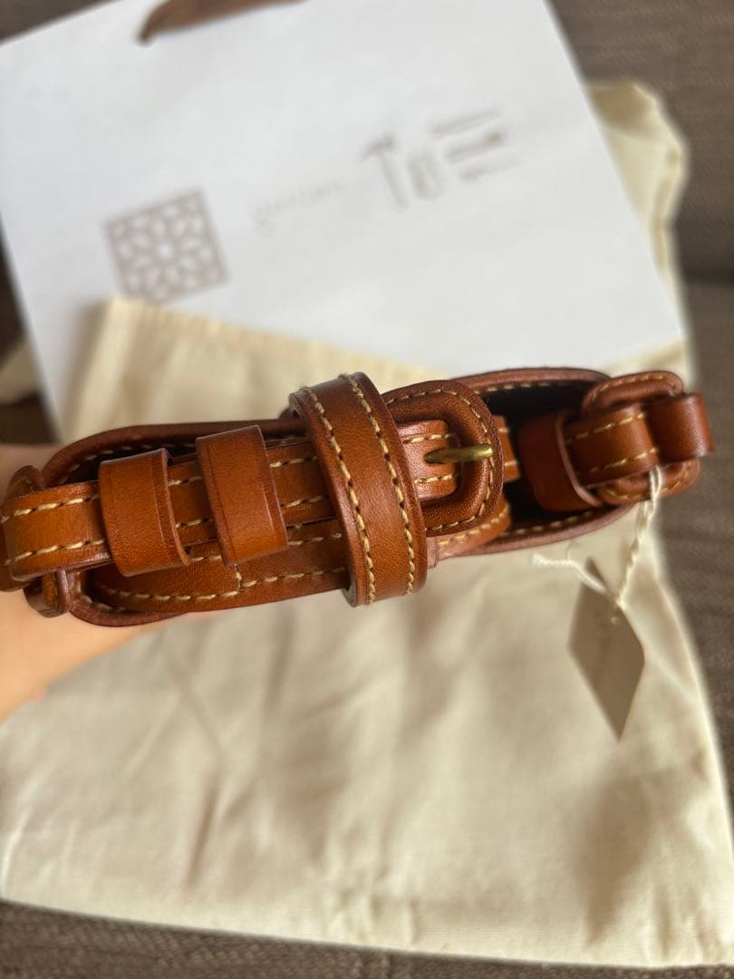 ゲンテン　genten カットワークレザー スマホショルダーバッグ ブラウン