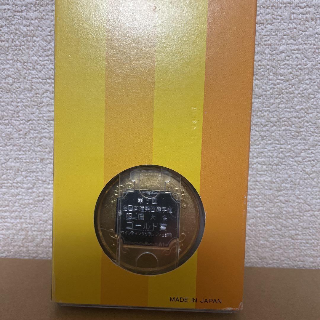 第５回日本ワインディング選手権のゴールド賞メダル、記念品です