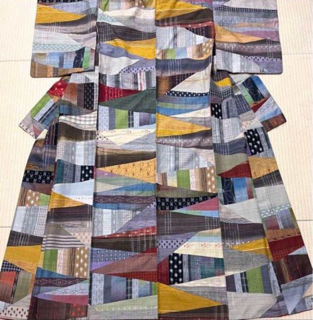 総切り嵌め 贅沢な逸品 赤の通し裏 真綿紬