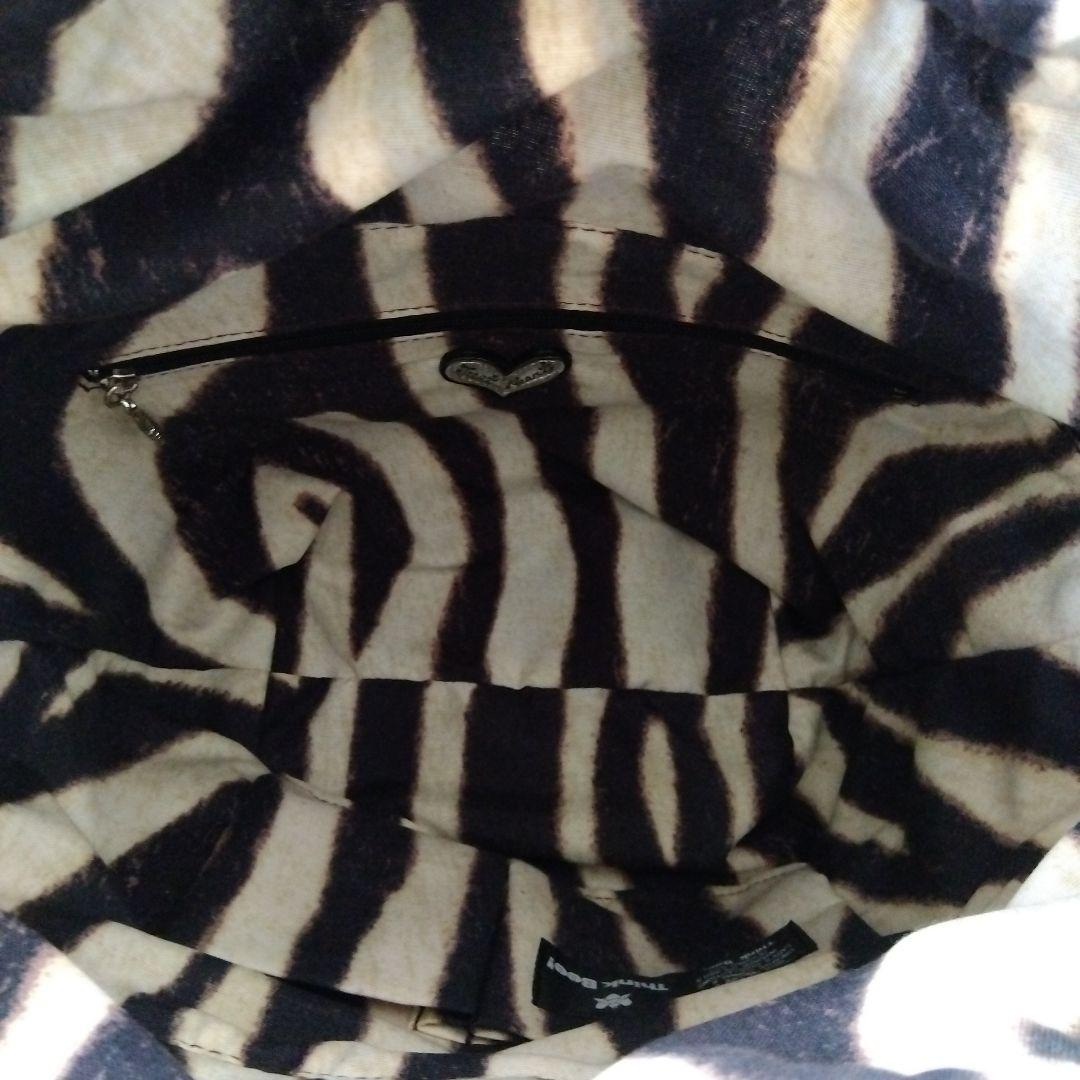 シンクビー　バッソサバーナバック　ブラック/アニマル柄（収納袋付き）