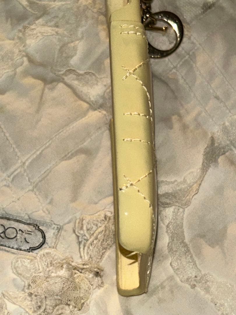 クリスチァンディオールアイホン12ケース イエロークリーム色新品未使用