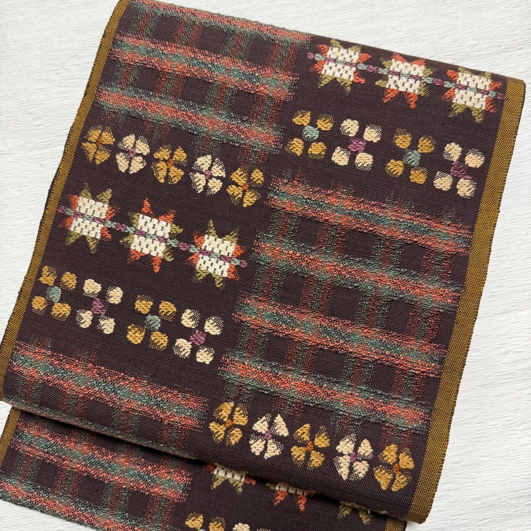 帯屋捨松 謹製 \"スウェーデン裂文\" 名古屋帯 正絹