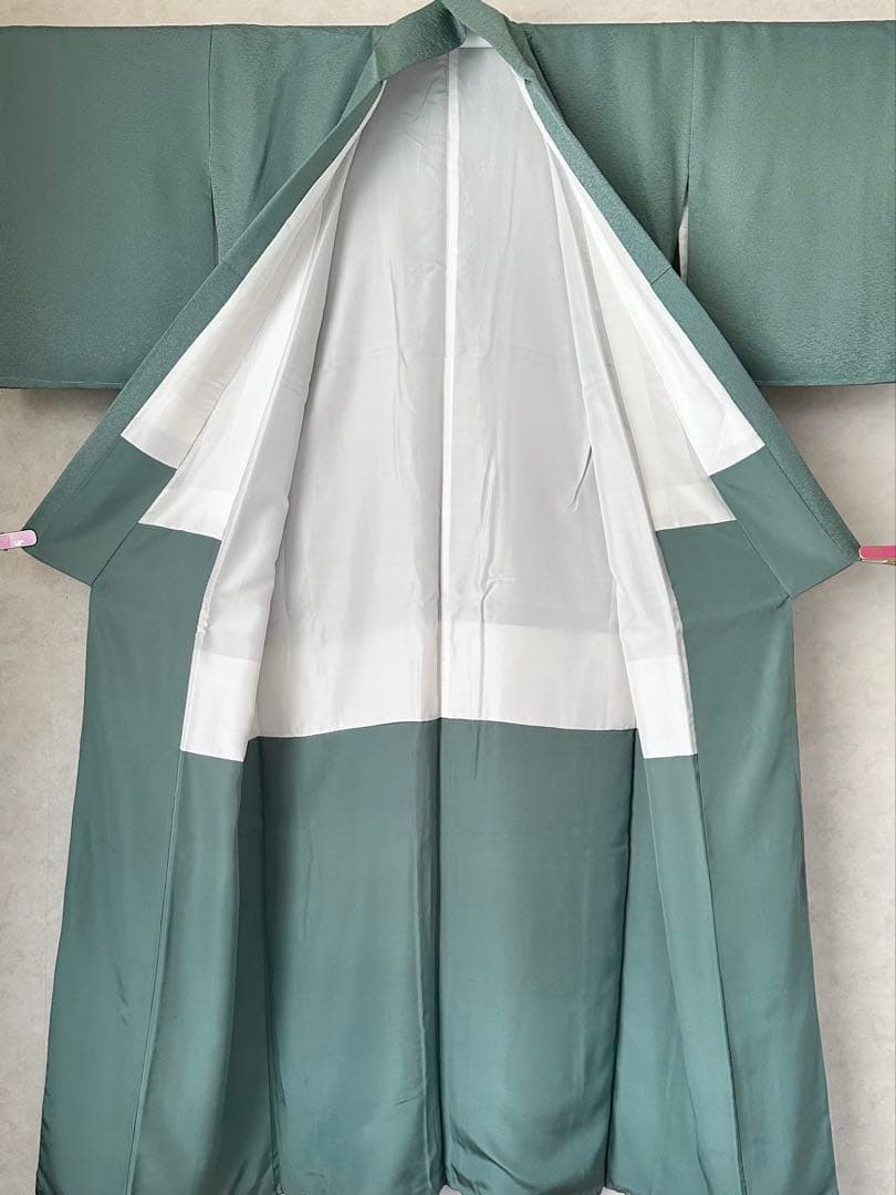 a09【在庫処分・特価】未使用 青緑 織柄 正絹 色無地 裄 64.5