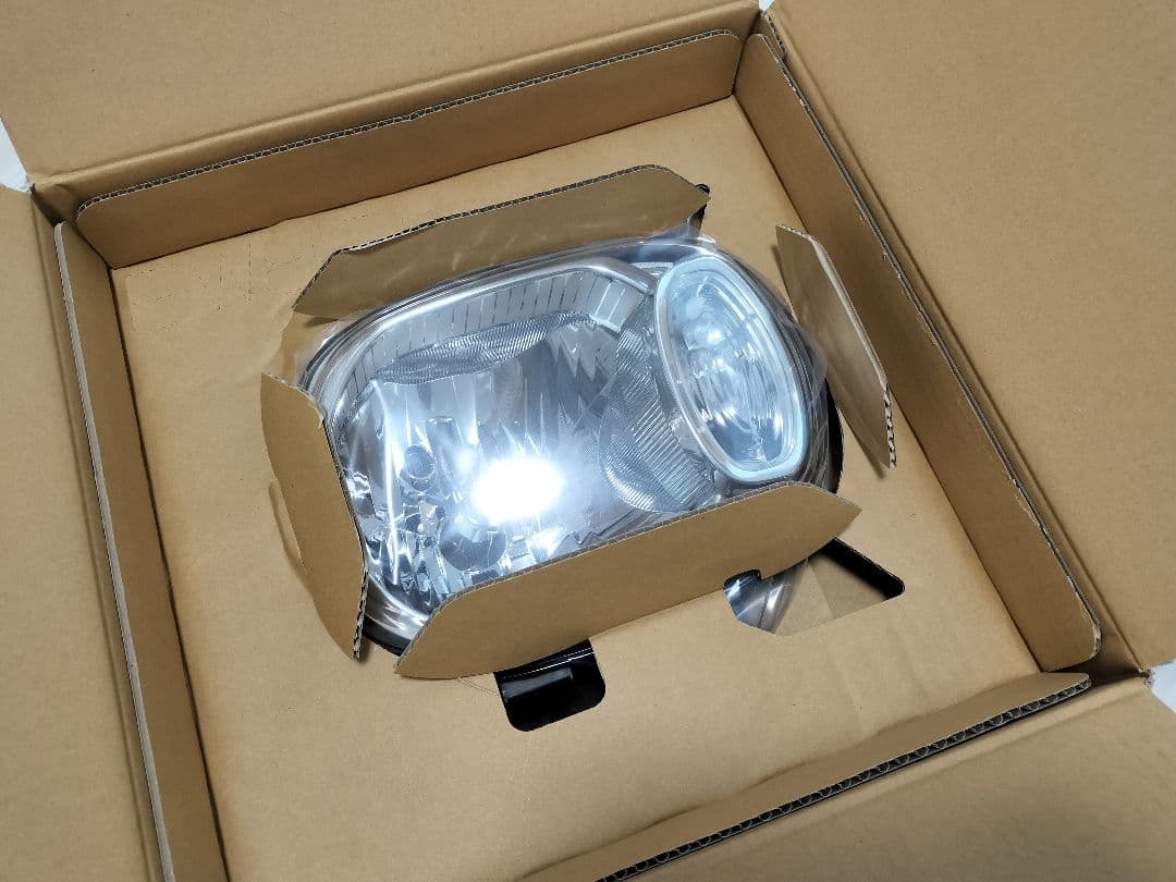 新品未使用　スズキ ラパン 純正ハロゲンヘッドライト 左右