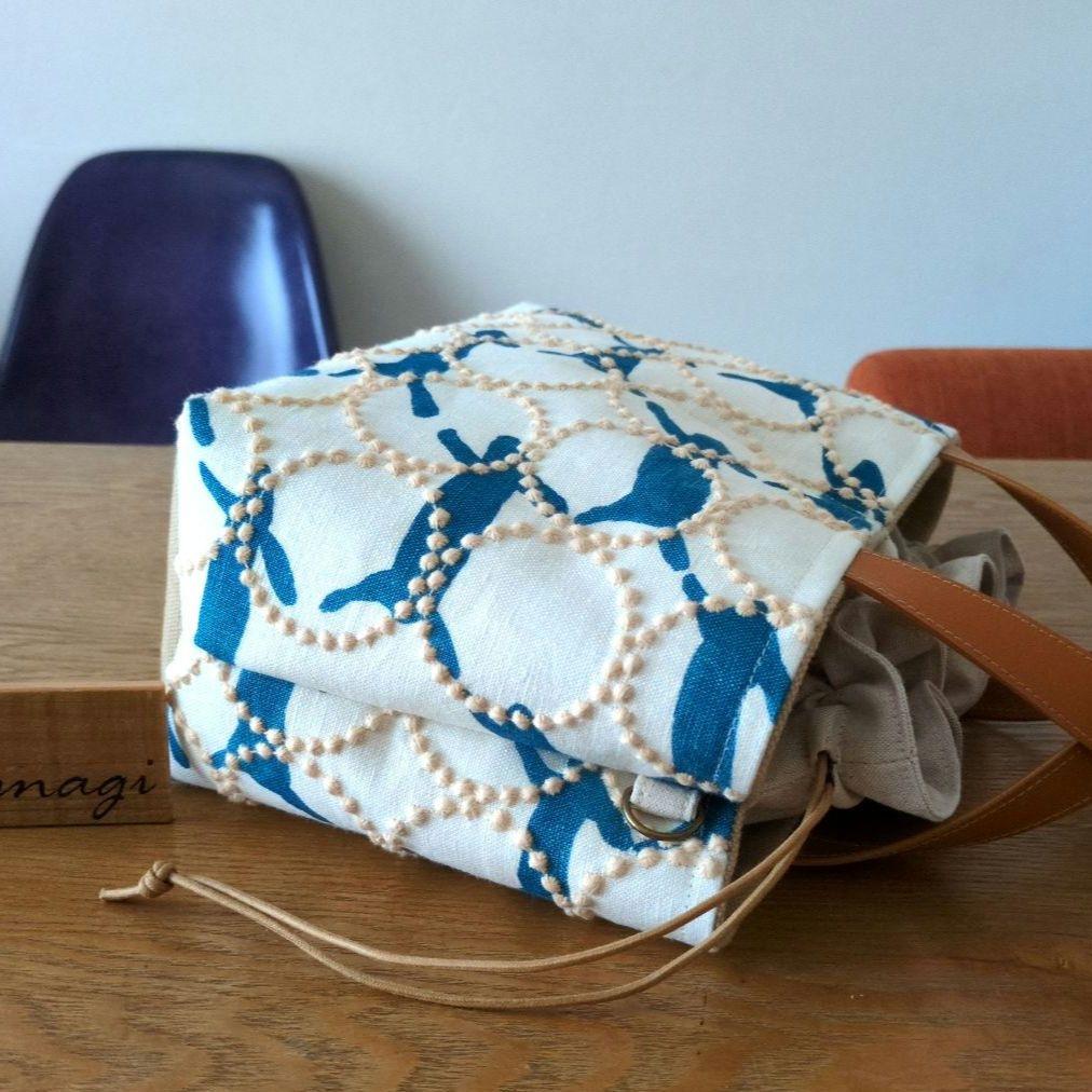 【1561】あおりポケットの巾着バッグ＊ミナペルホネン