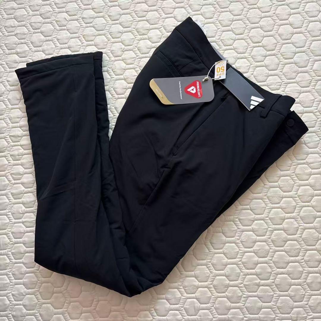 82新品27500円アディダスゴルフ/メンズ/秋冬/中綿ストレッチパンツ/黒