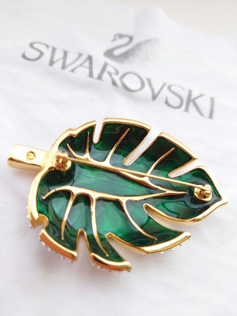 SWAROVSKI 大ぶりリーフ ブロー パヴェ ゴールド カラー