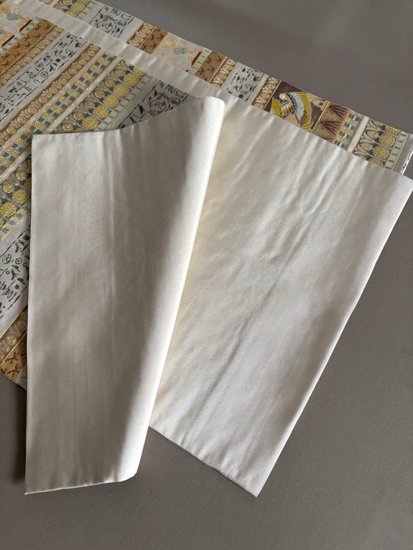 川島織物 アイボリー インカ文様 六通柄 本袋帯